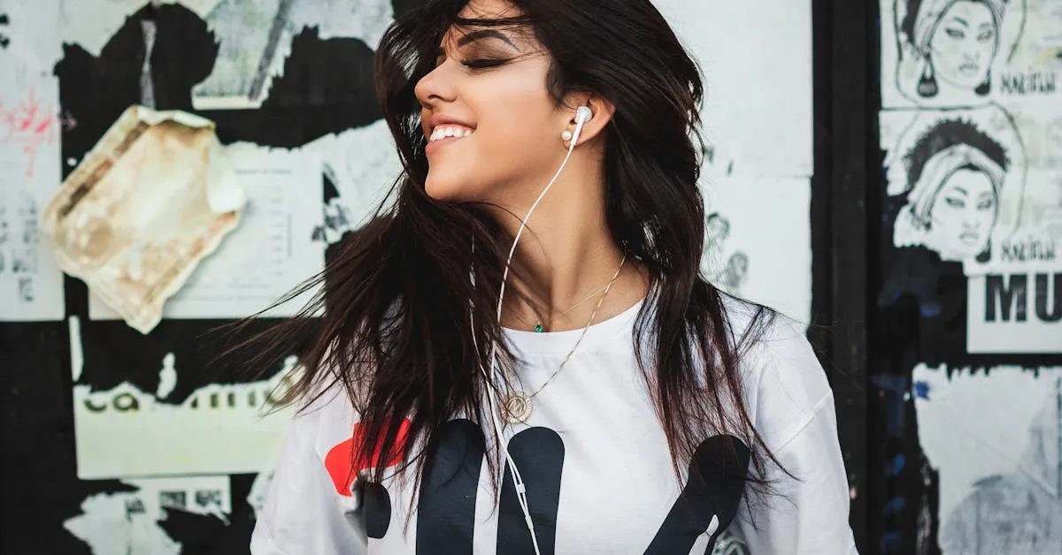 A women listening to positive, encouraging, and uplifting music; she looks happy and having fun. Learn about the importance of listening to positive music.