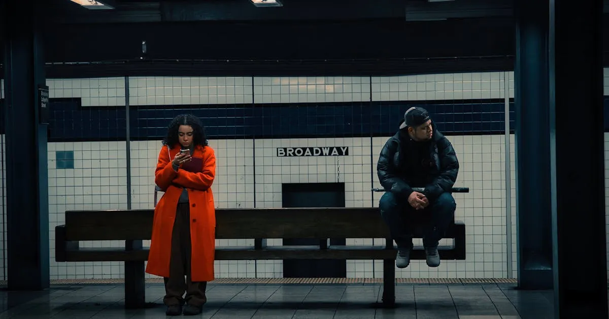 A man and a woman patiently waiting at a subway station. Can we patiently wait for God to help us?